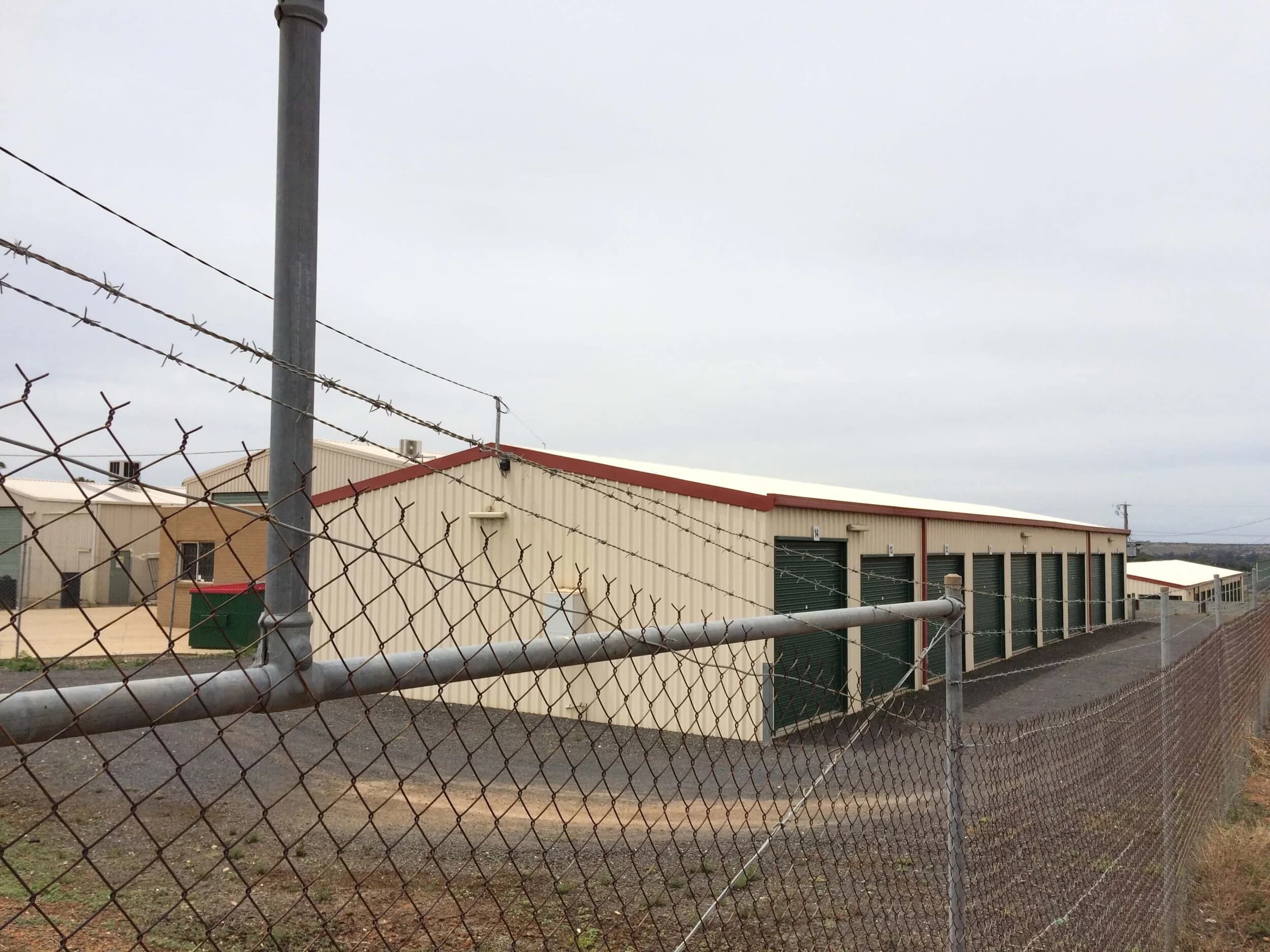 Barbed wire security fencing around the facility