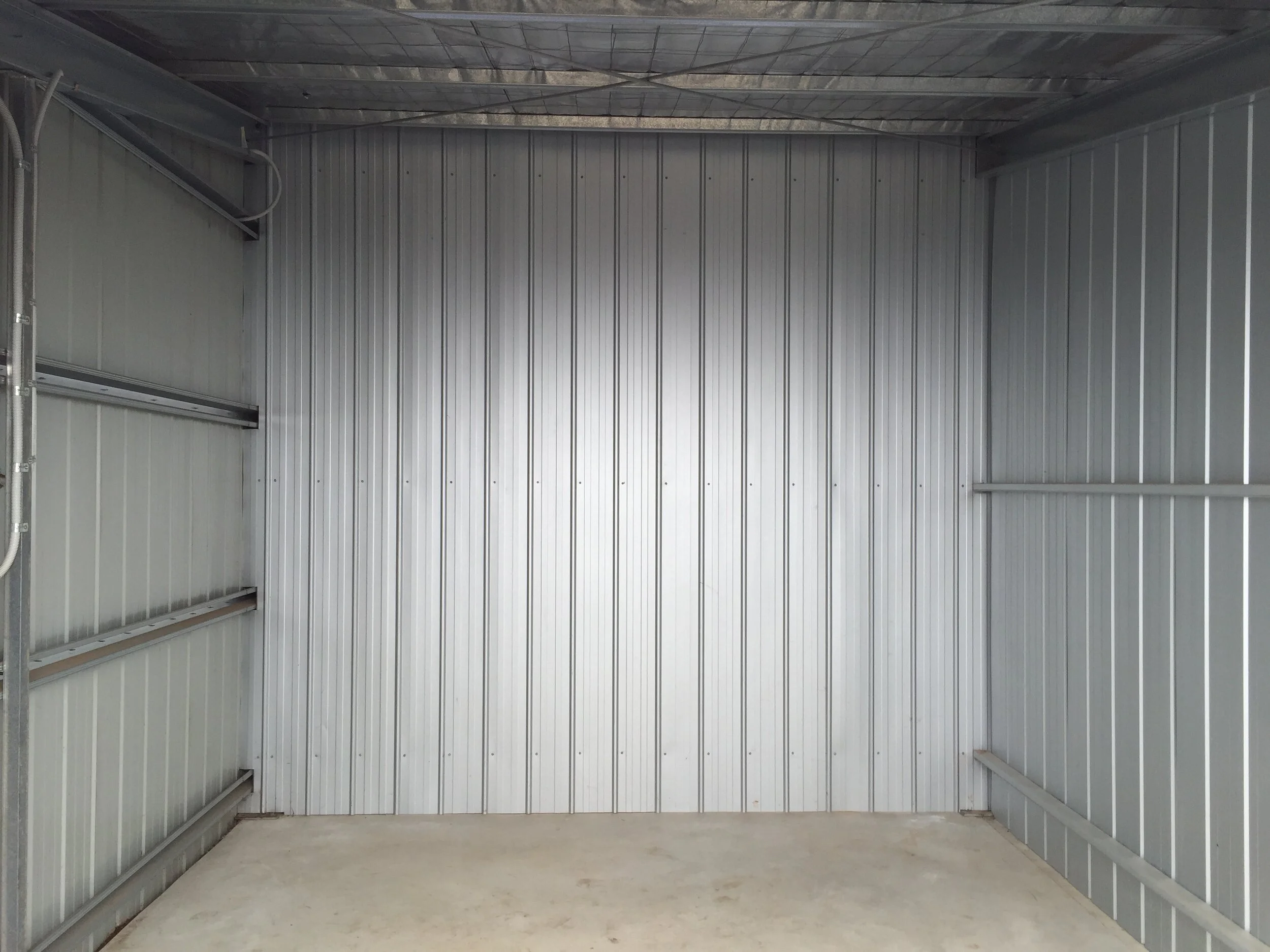 Inside an empty unit, showing the full 3m ceiling height